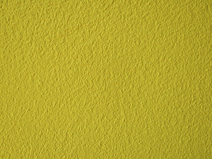 geel getextureerde muur
